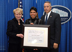Photo of Assistant Attorney General Laurie O. Robinson and Robin Delany-Shabazz, Designated Federal Official, Coordinating Council on Juvenile Justice and Delinquency Prevention and the Federal Advisory Committee on Juvenile Justice.