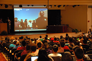 Youth watch the public service announcement.